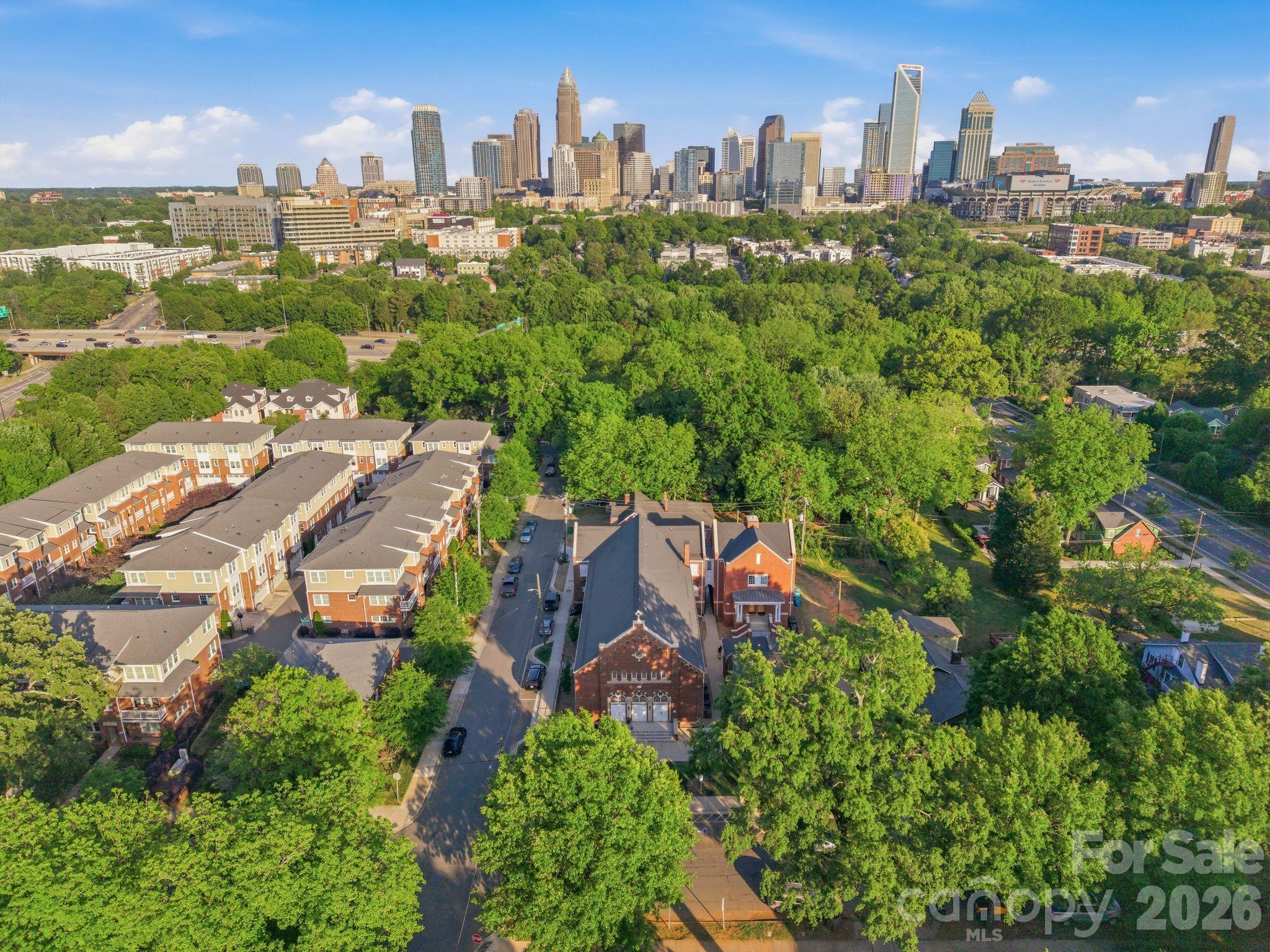 201 Grandin Road, Unit 9 Charlotte, NC 28208 - Photo 33 of 43 an aerial view of a city with lots of residential buildings