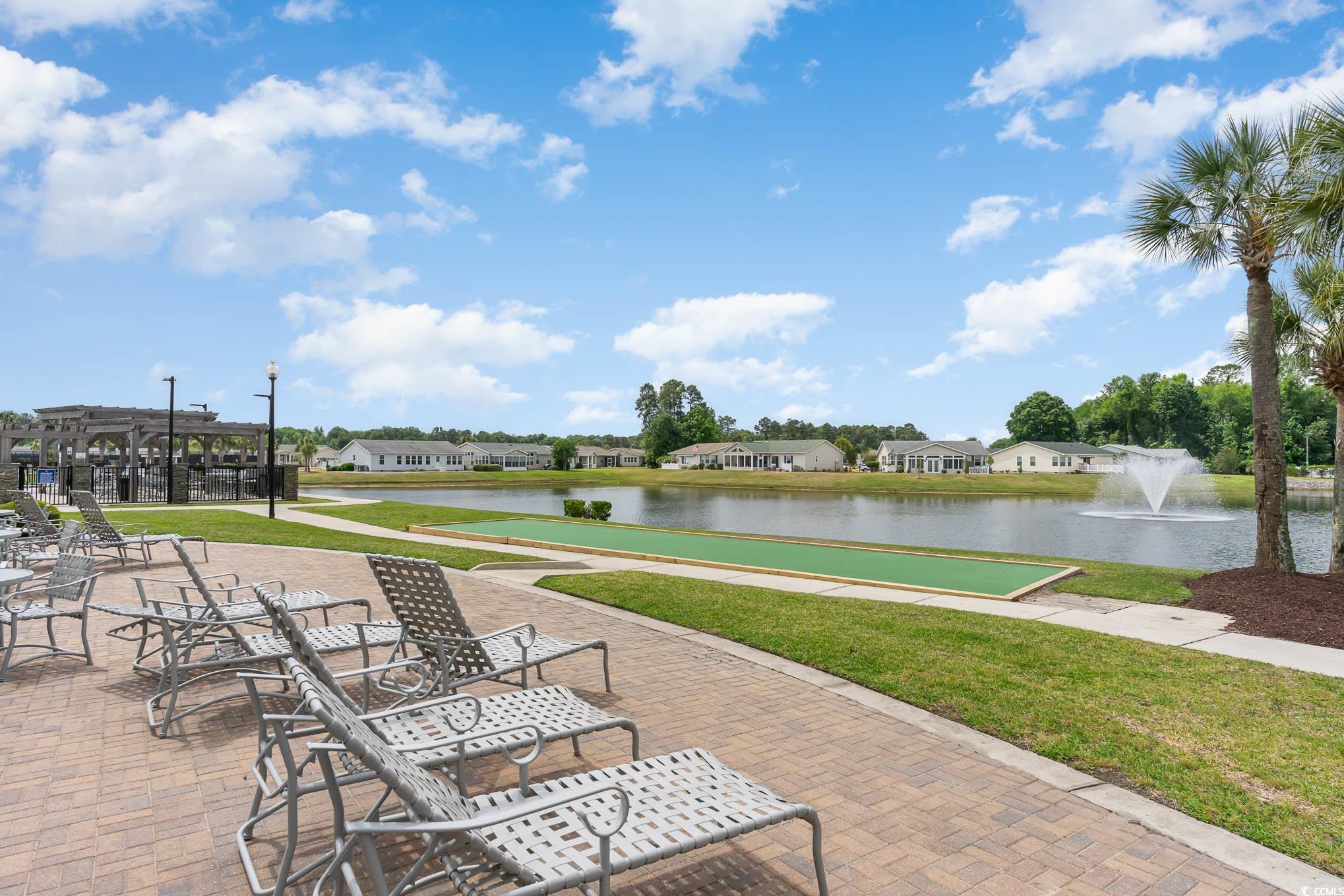 237 Wellspring Drive Conway, SC 29526 - Photo 27 of 33 View of tennis court with community basketball court and a residential view