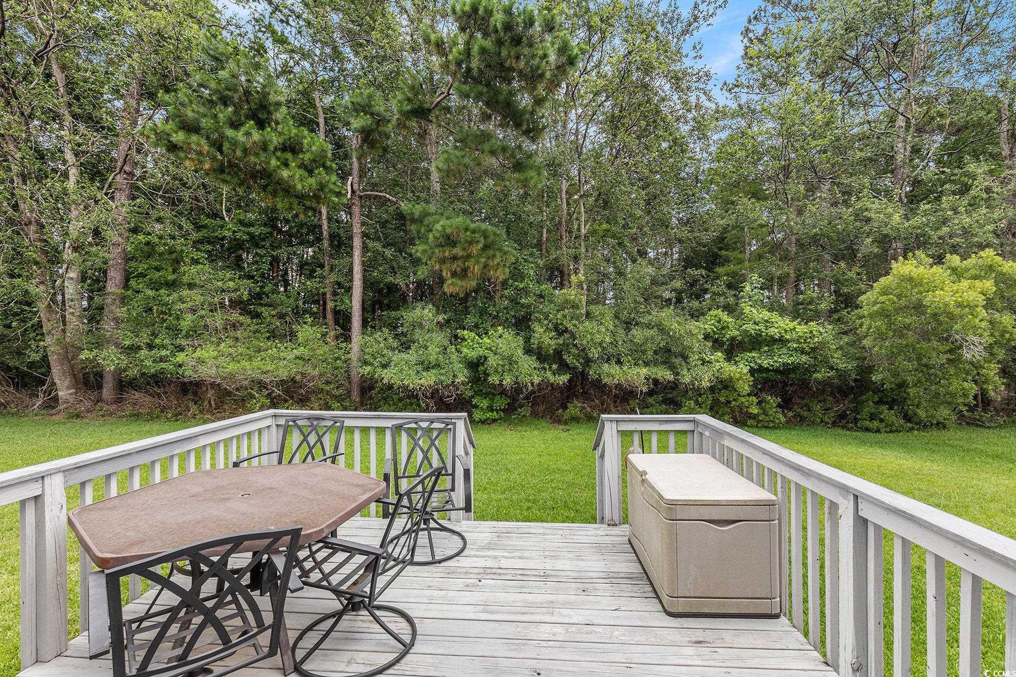 237 Wellspring Drive Conway, SC 29526 - Photo 6 of 34 Deck featuring a lawn and outdoor dining space