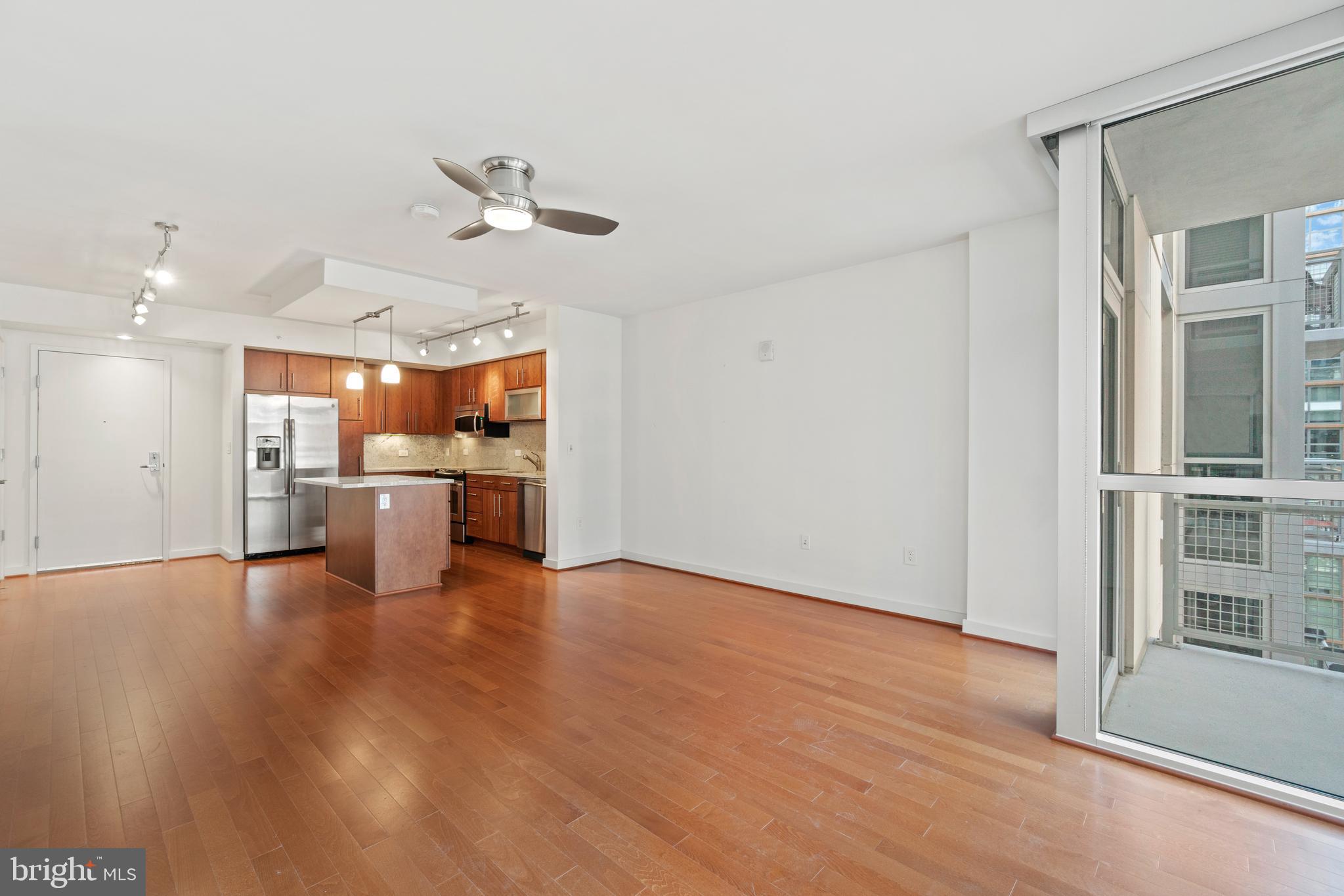 1025 First Street Southeast, Unit 801 Washington, DC 20003 - Photo 6 of 22 a view of a kitchen with a sink and a refrigerator