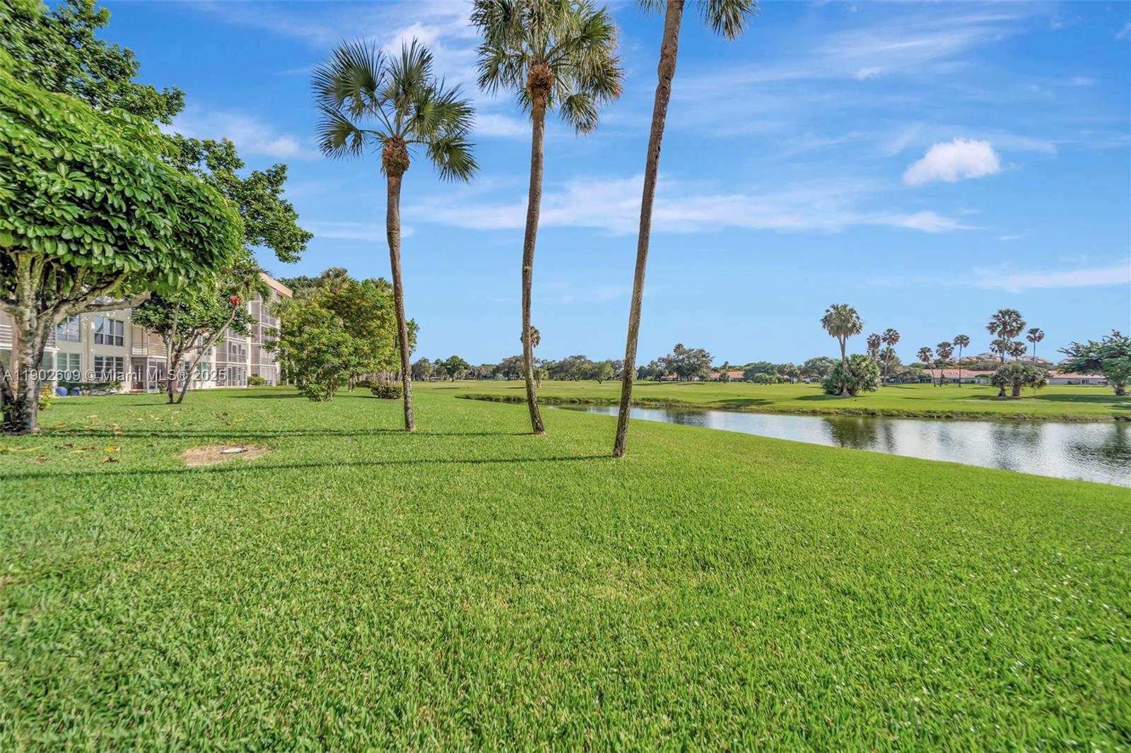 3980 Oaks Clubhouse Drive, Unit 409 Pompano Beach, FL 33069 - Photo 52 of 70 a view of a golf course
