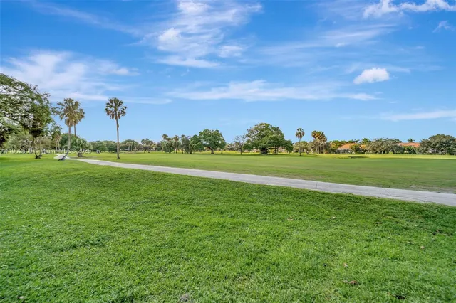 $299,000 | 3980 Oaks Clubhouse Drive, Unit 409, Pompano Beach, FL 33069