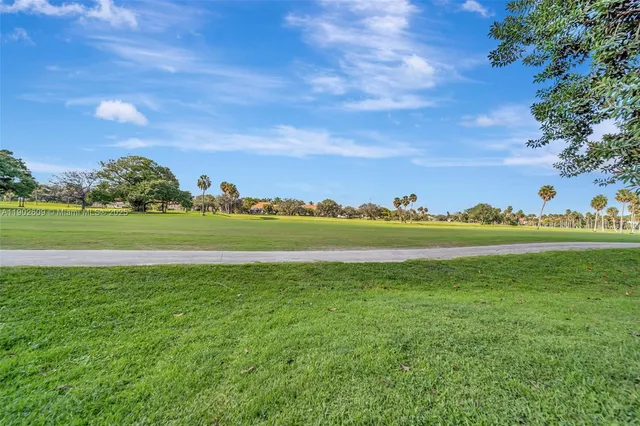 $299,000 | 3980 Oaks Clubhouse Drive, Unit 409, Pompano Beach, FL 33069