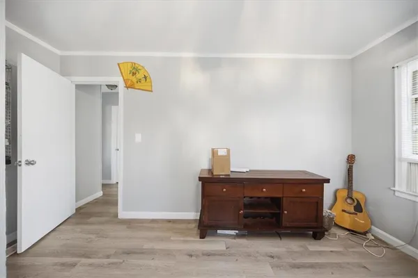 a view of room and front door