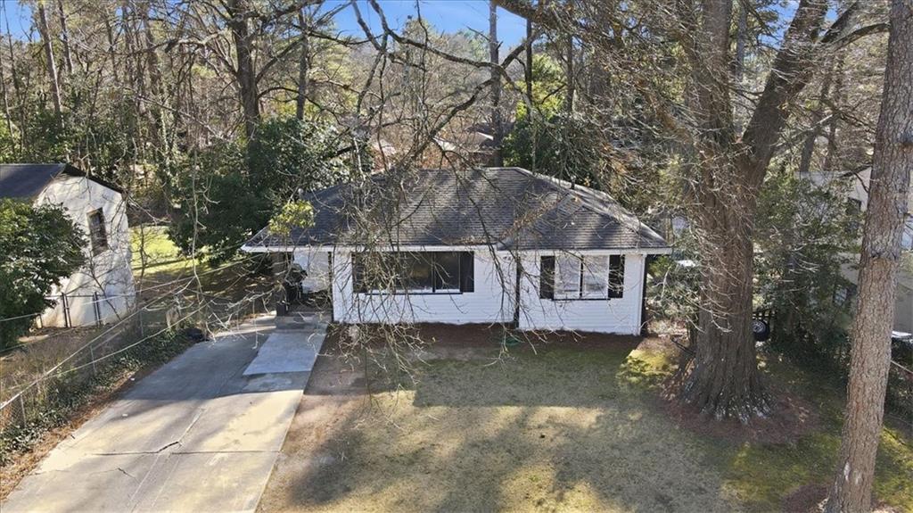 2363 Woodside Way Atlanta, GA 30341 - Photo 29 of 30 a front view of a house with a yard