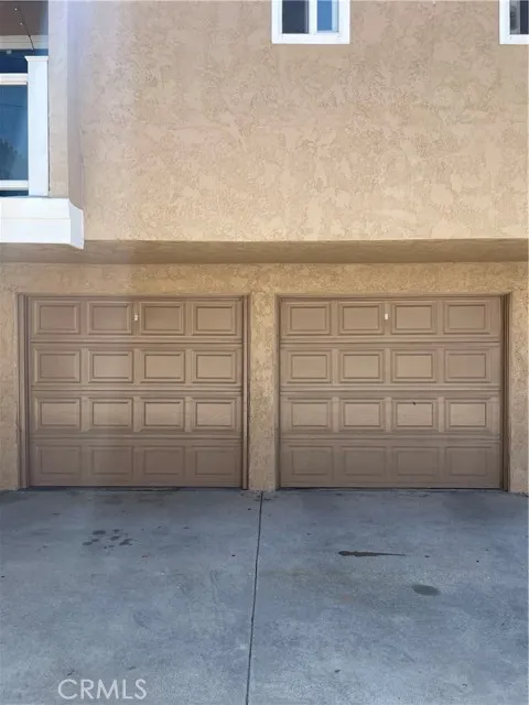 209 13th Street, Unit D Huntington Beach, CA 92648 - Photo 28 of 34 a view of a garage