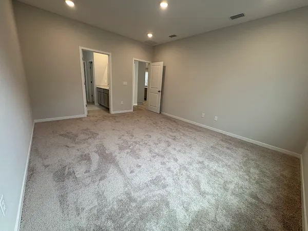 an empty room with an entryway