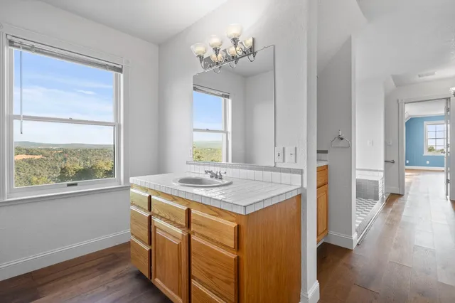 a view of a house with a street