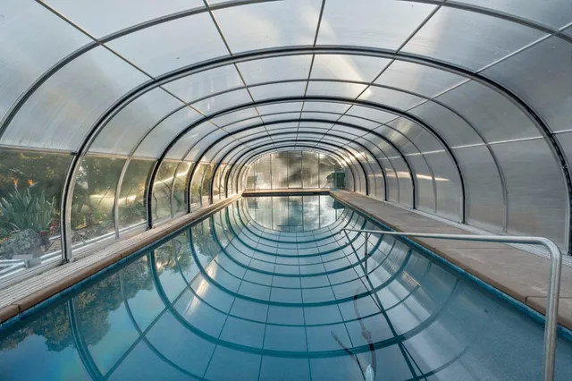 a view of a balcony with wooden floor