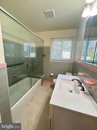 a bathroom with a sink and a bathtub