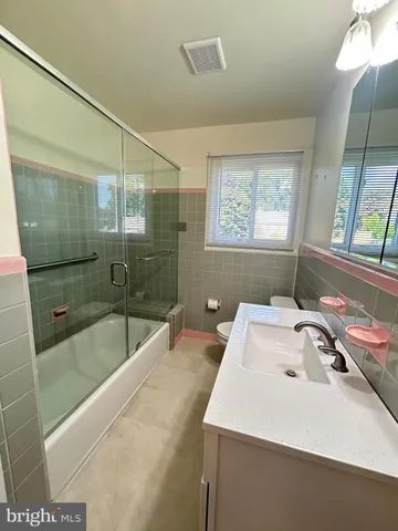 a bathroom with a sink and a bathtub