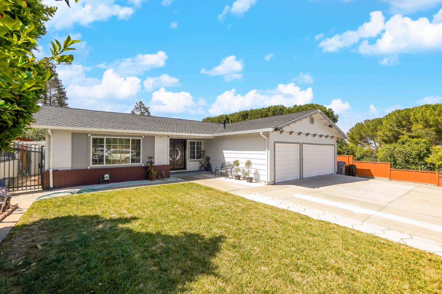 3610 Norwood Avenue San Jose, CA 95148 - Photo 1 of 54 a view of a house with swimming pool and a yard