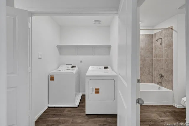 a utility room with dryer and washer