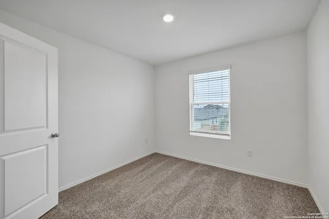 an empty room with a window