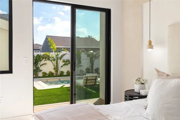 a bathroom with a double vanity sink mirror and shower