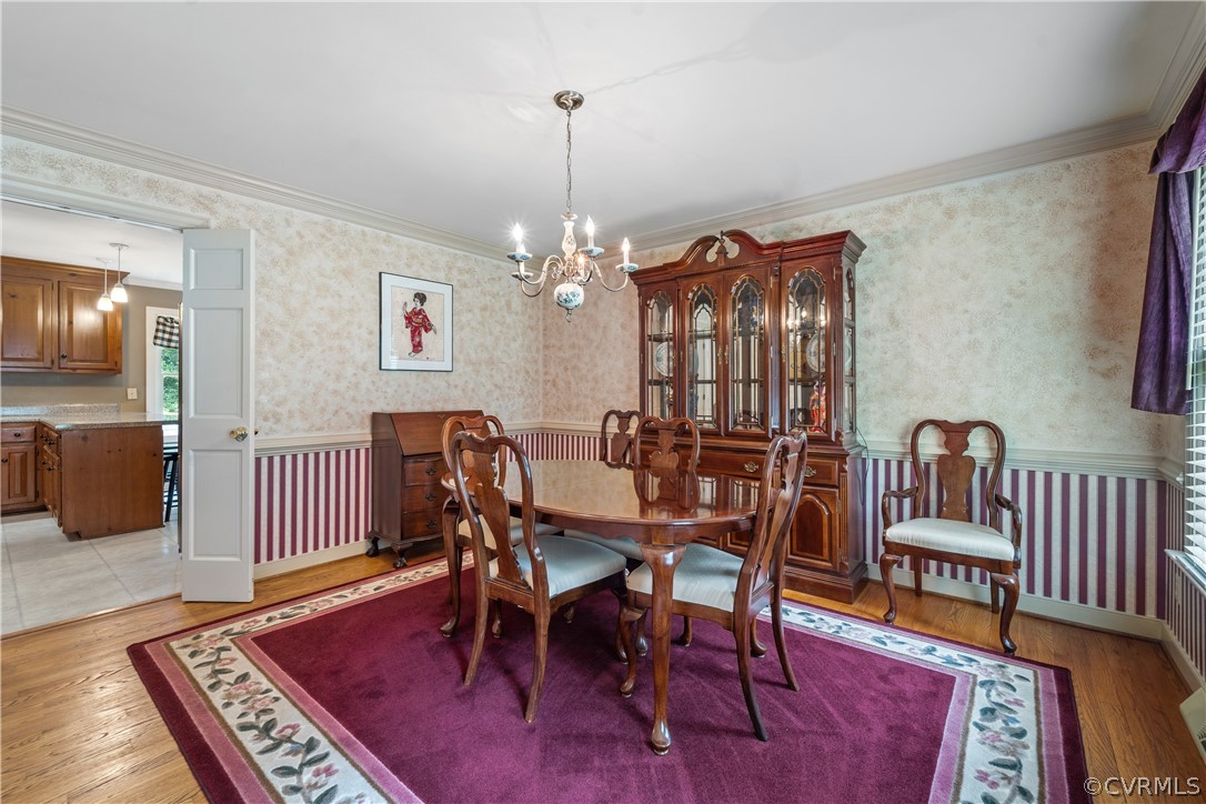 5609 North Chase Road Midlothian, VA 23112 - Photo 14 of 43 a view of a dining room with furniture