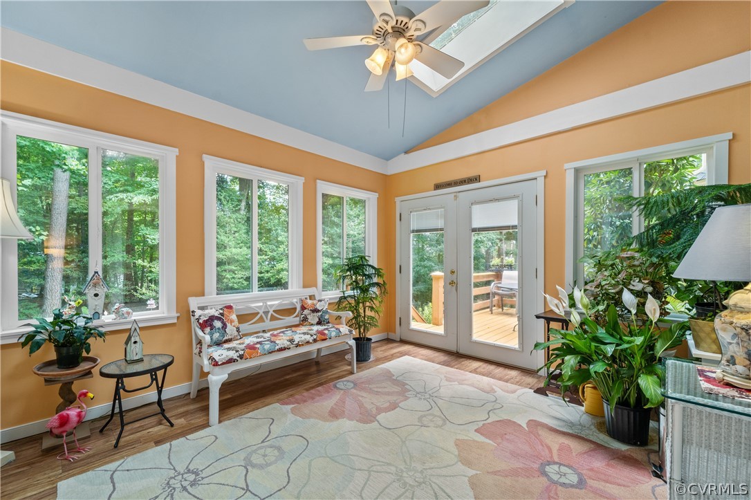 5609 North Chase Road Midlothian, VA 23112 - Photo 18 of 43 a living room with patio furniture and a potted plant
