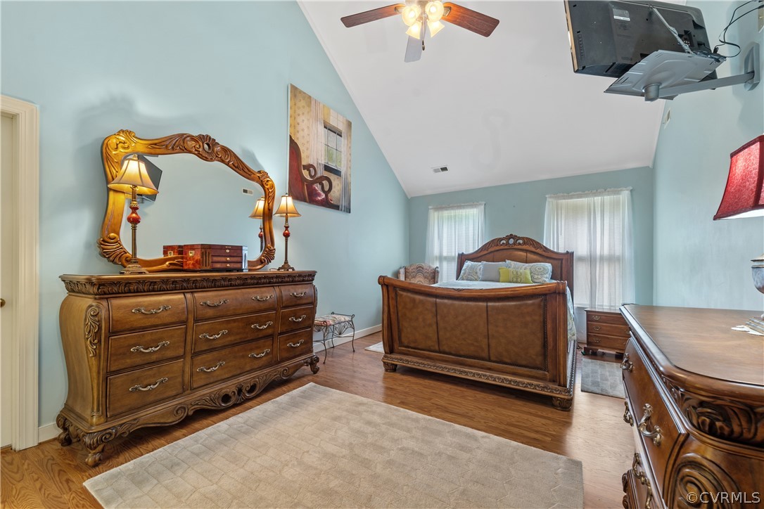 5609 North Chase Road Midlothian, VA 23112 - Photo 21 of 43 a bedroom with a bed and a dresser