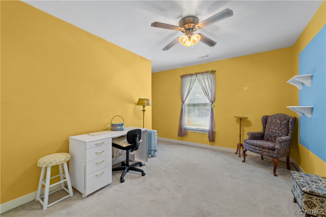 5609 North Chase Road Midlothian, VA 23112 - Photo 26 of 43 a view of a workspace with furniture and a window