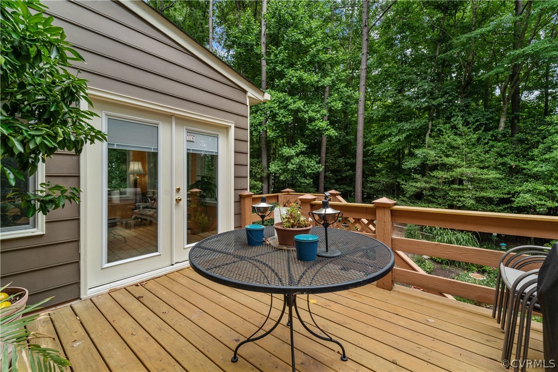 5609 North Chase Road Midlothian, VA 23112 - Photo 36 of 43 a view of balcony with table and chairs
