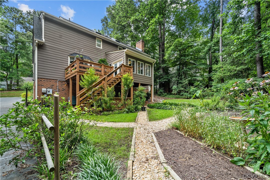 5609 North Chase Road Midlothian, VA 23112 - Photo 38 of 43 a front view of a house with garden