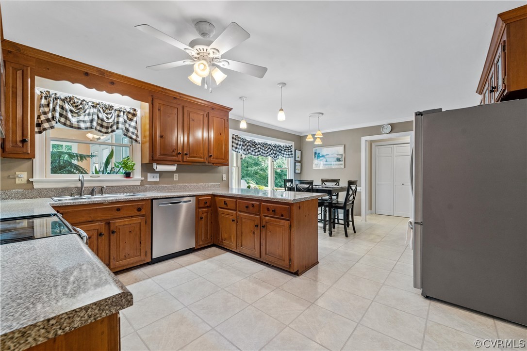 5609 North Chase Road Midlothian, VA 23112 - Photo 5 of 43 a kitchen with stainless steel appliances granite countertop a refrigerator and a sink