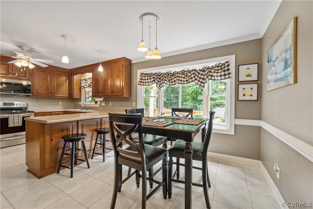 5609 North Chase Road Midlothian, VA 23112 - Photo 7 of 43 a view of a dining room with furniture window and outside view