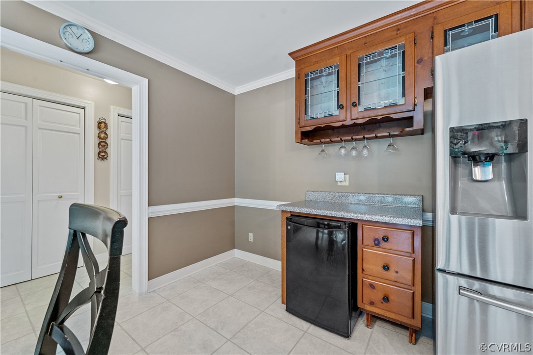 5609 North Chase Road Midlothian, VA 23112 - Photo 9 of 43 a kitchen with stainless steel appliances granite countertop a refrigerator and a sink