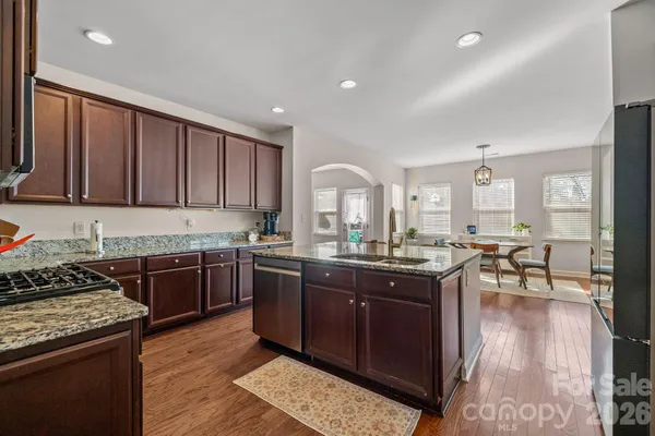a kitchen with lots of counter top space and appliances