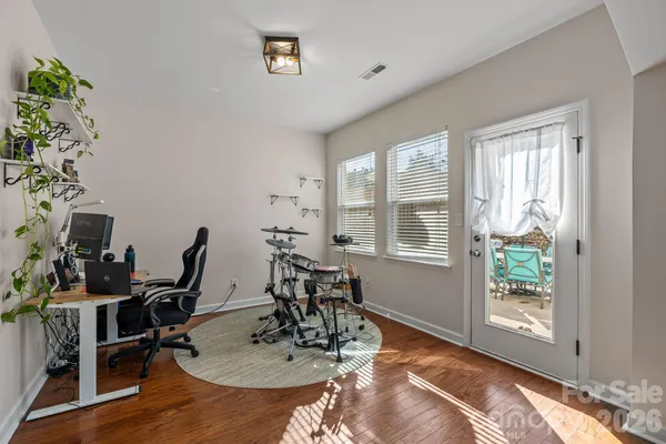 a view of a dining room with furniture window and outside view