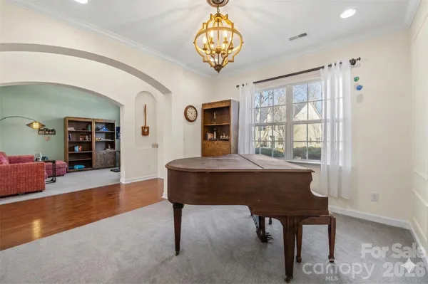 a view of a livingroom with furniture and window