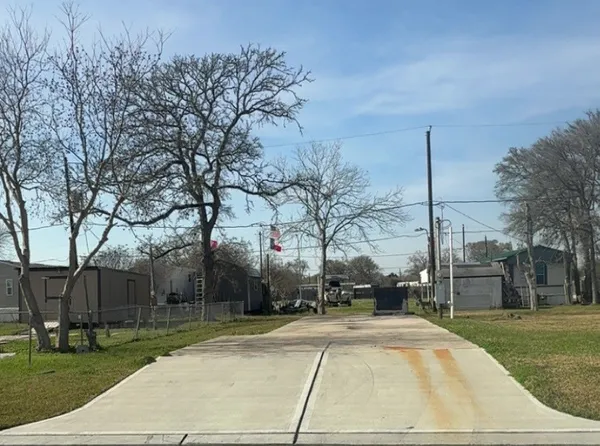 a view of road with trees