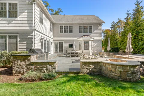 a front view of a house with swimming pool