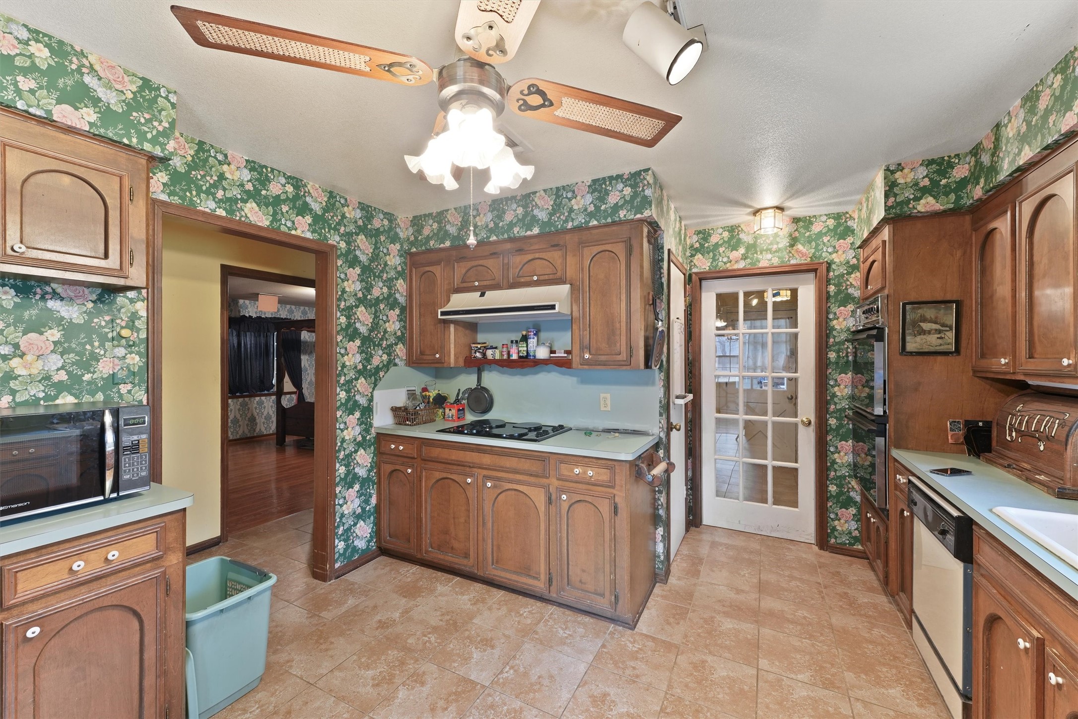 31926 Dobbin-Huffsmith Road Magnolia, TX 77354 - Photo 14 of 47 a kitchen with stainless steel appliances granite countertop a stove oven and a refrigerator