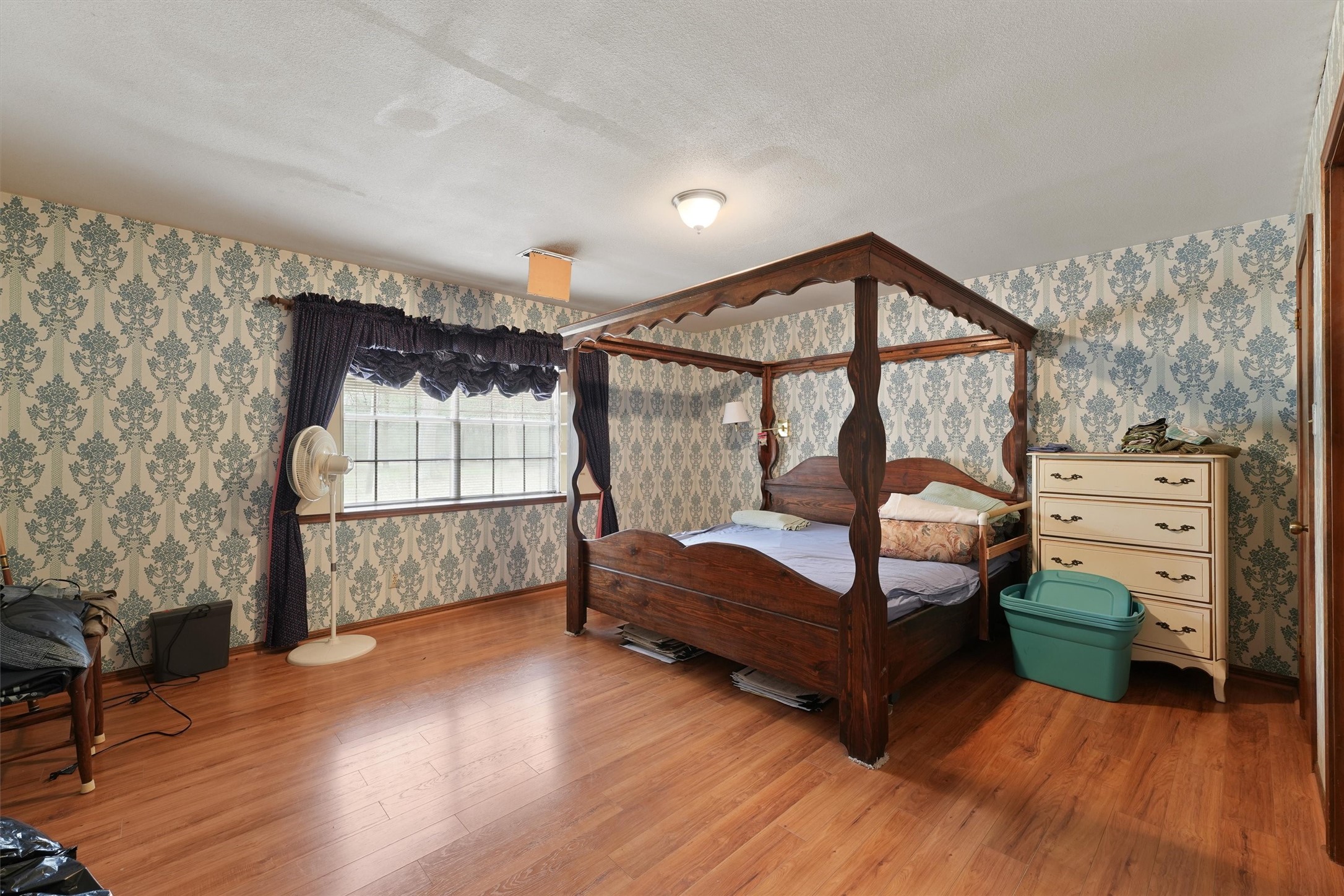 31926 Dobbin-Huffsmith Road Magnolia, TX 77354 - Photo 15 of 47 a bedroom with furniture and window