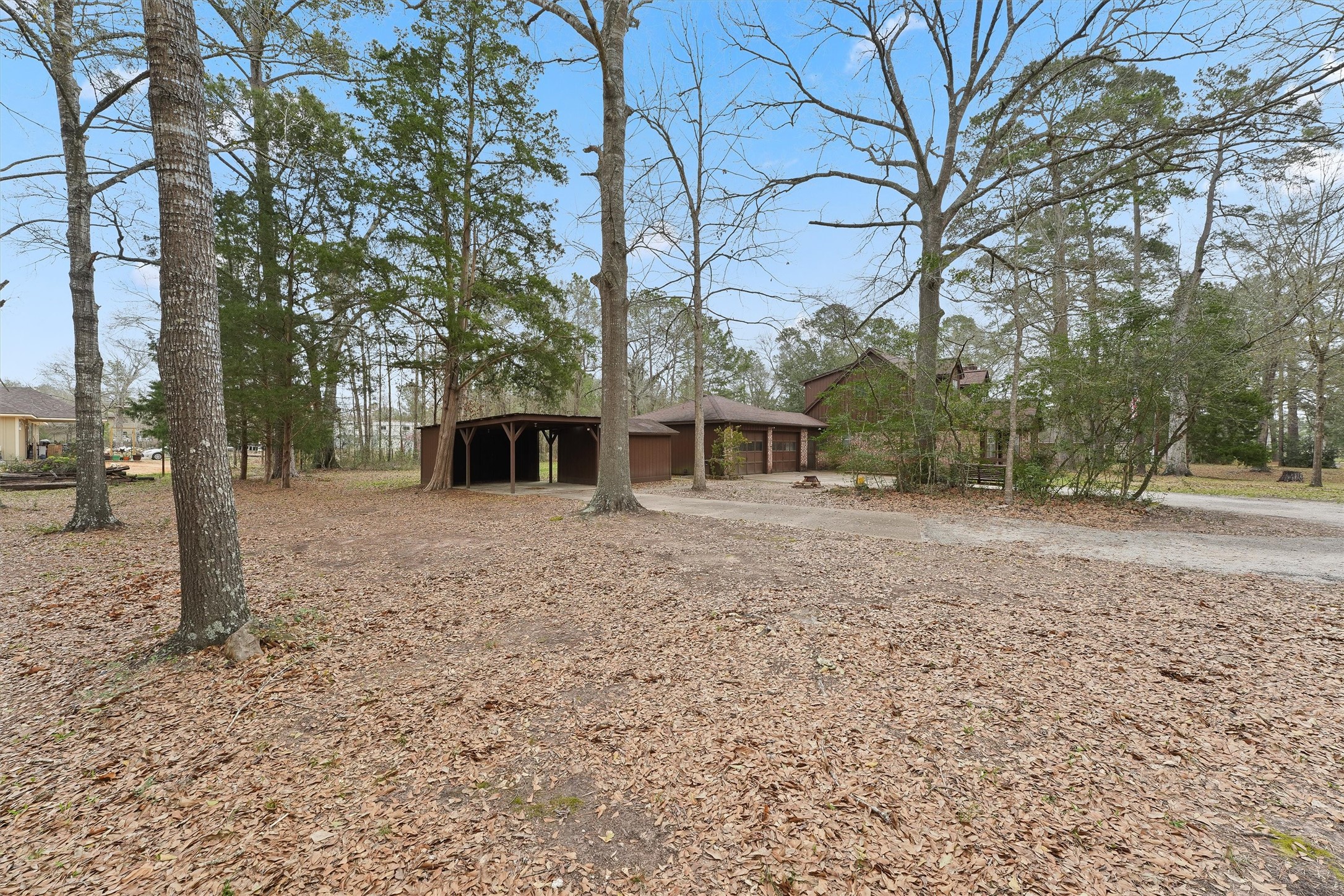 31926 Dobbin-Huffsmith Road Magnolia, TX 77354 - Photo 21 of 47 a front view of a house with a yard