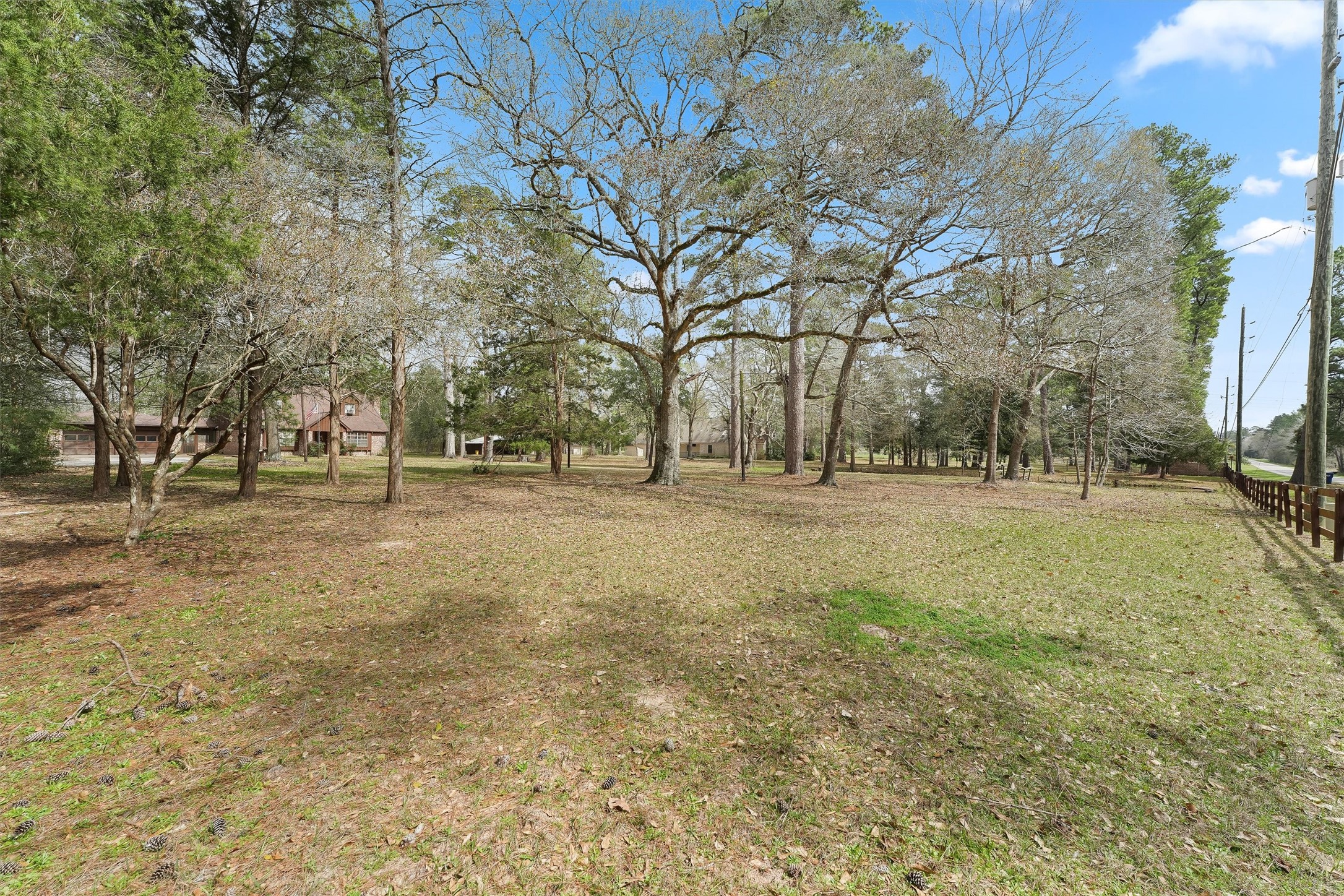 31926 Dobbin-Huffsmith Road Magnolia, TX 77354 - Photo 34 of 47 a view of outdoor space with trees