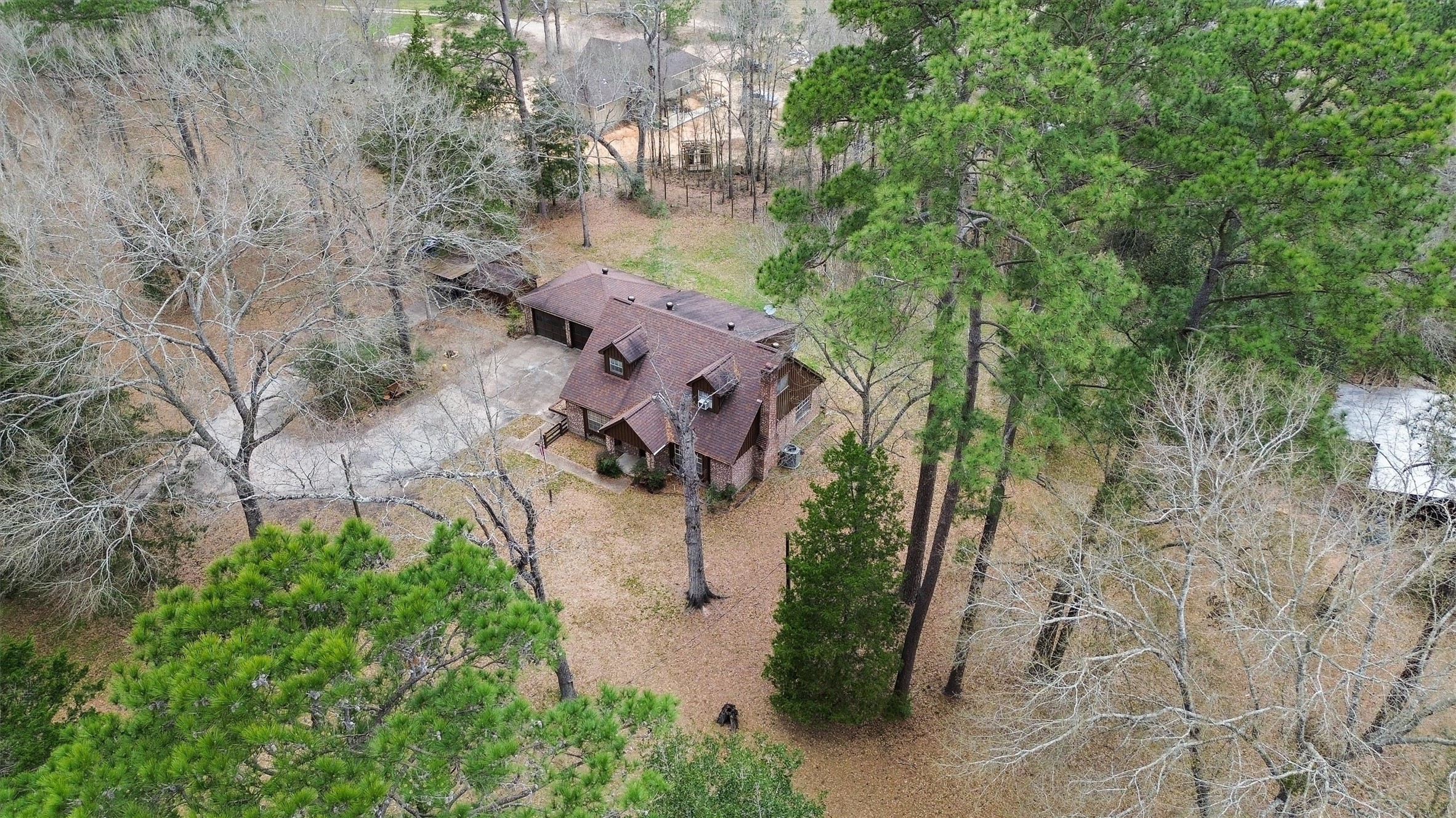 31926 Dobbin-Huffsmith Road Magnolia, TX 77354 - Photo 35 of 47 an aerial view of a house with a yard