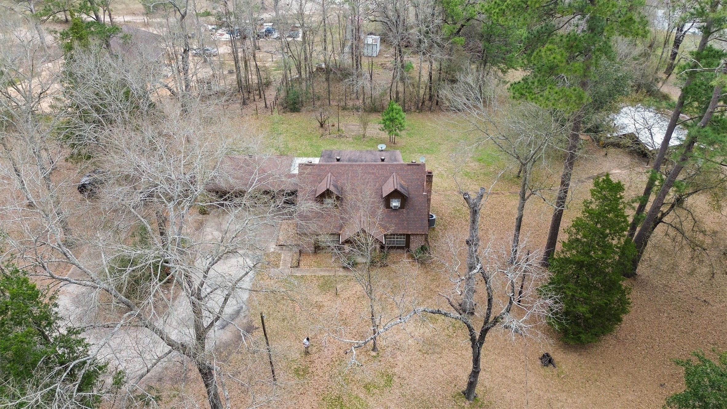 31926 Dobbin-Huffsmith Road Magnolia, TX 77354 - Photo 36 of 47 an aerial view of a house with a yard