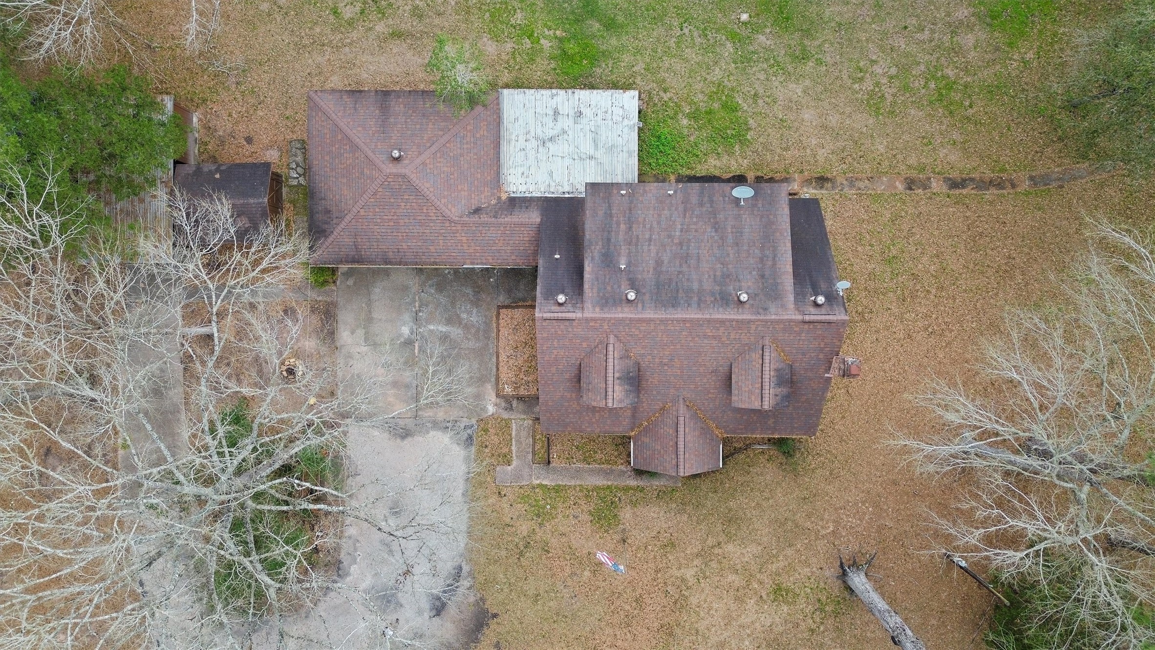 31926 Dobbin-Huffsmith Road Magnolia, TX 77354 - Photo 38 of 47 an aerial view of a house with a yard and large tree