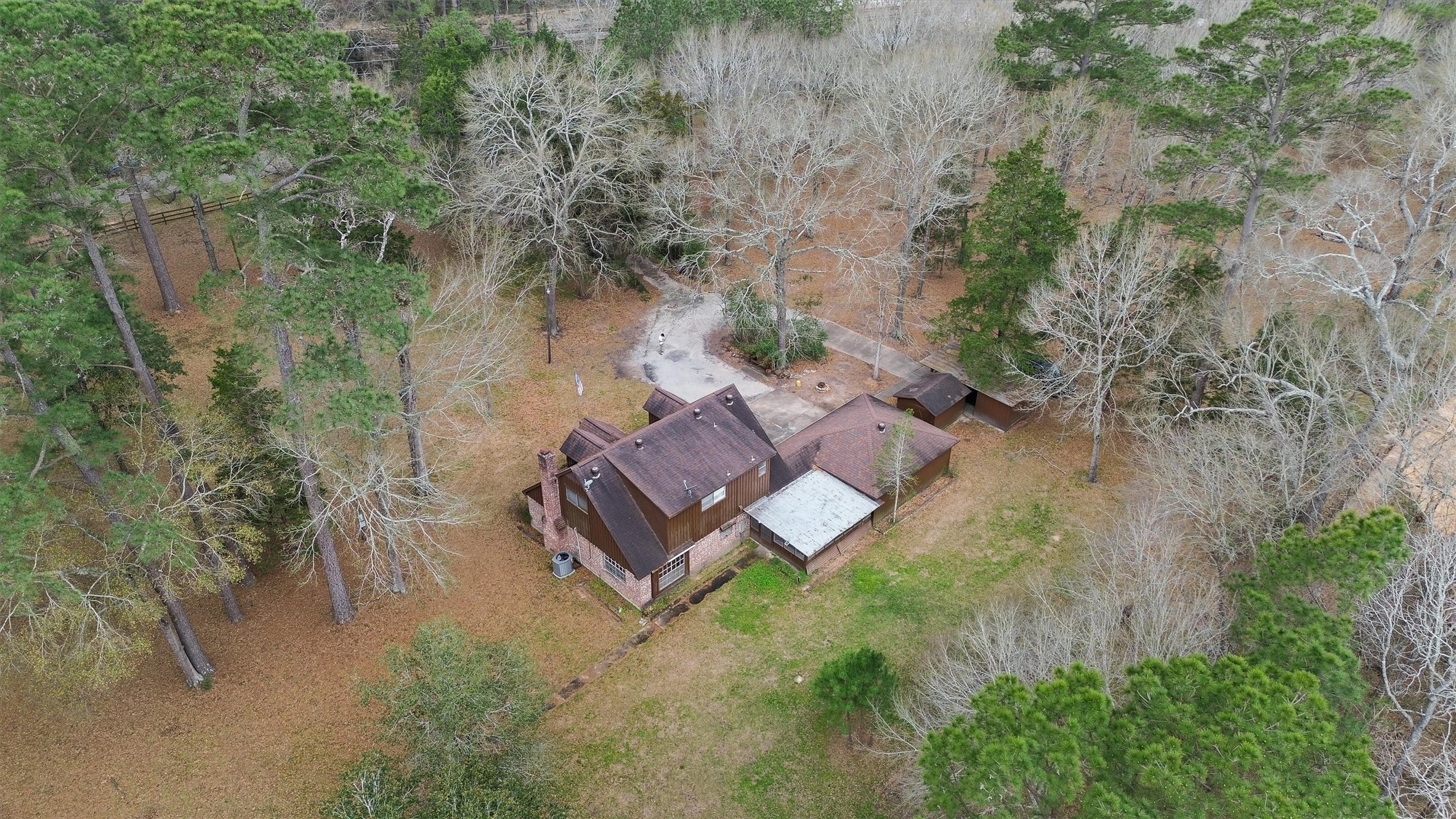 31926 Dobbin-Huffsmith Road Magnolia, TX 77354 - Photo 39 of 47 an aerial view of a house with a yard