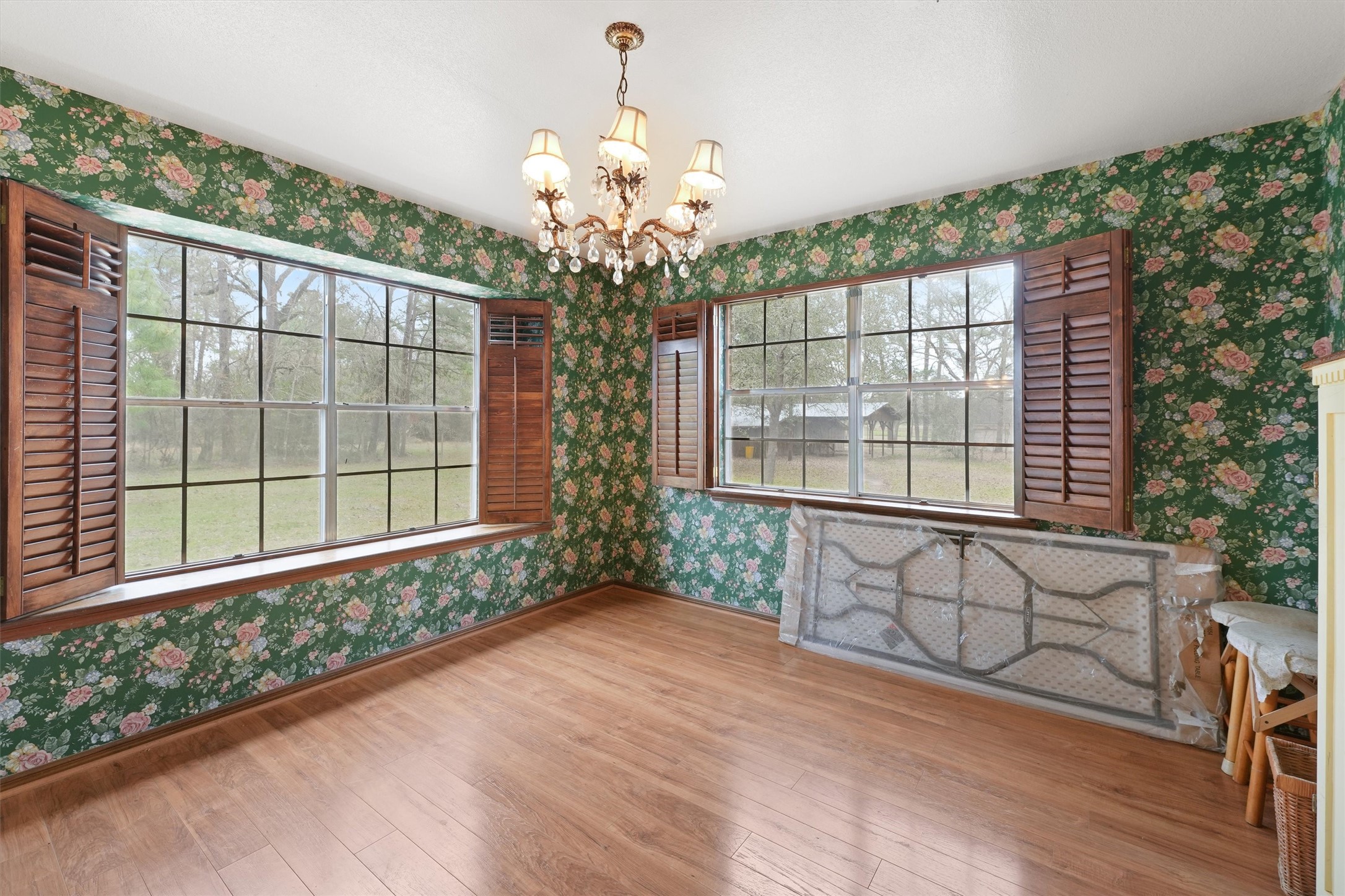 31926 Dobbin-Huffsmith Road Magnolia, TX 77354 - Photo 9 of 47 a view of a room with wooden floor and large windows