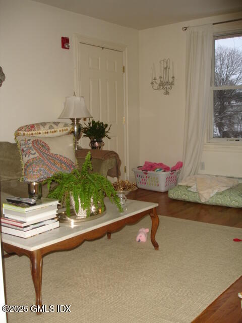 174 Davis Avenue, Unit 3A Greenwich, CT 06830 - Photo 2 of 7 a room with a table and chairs