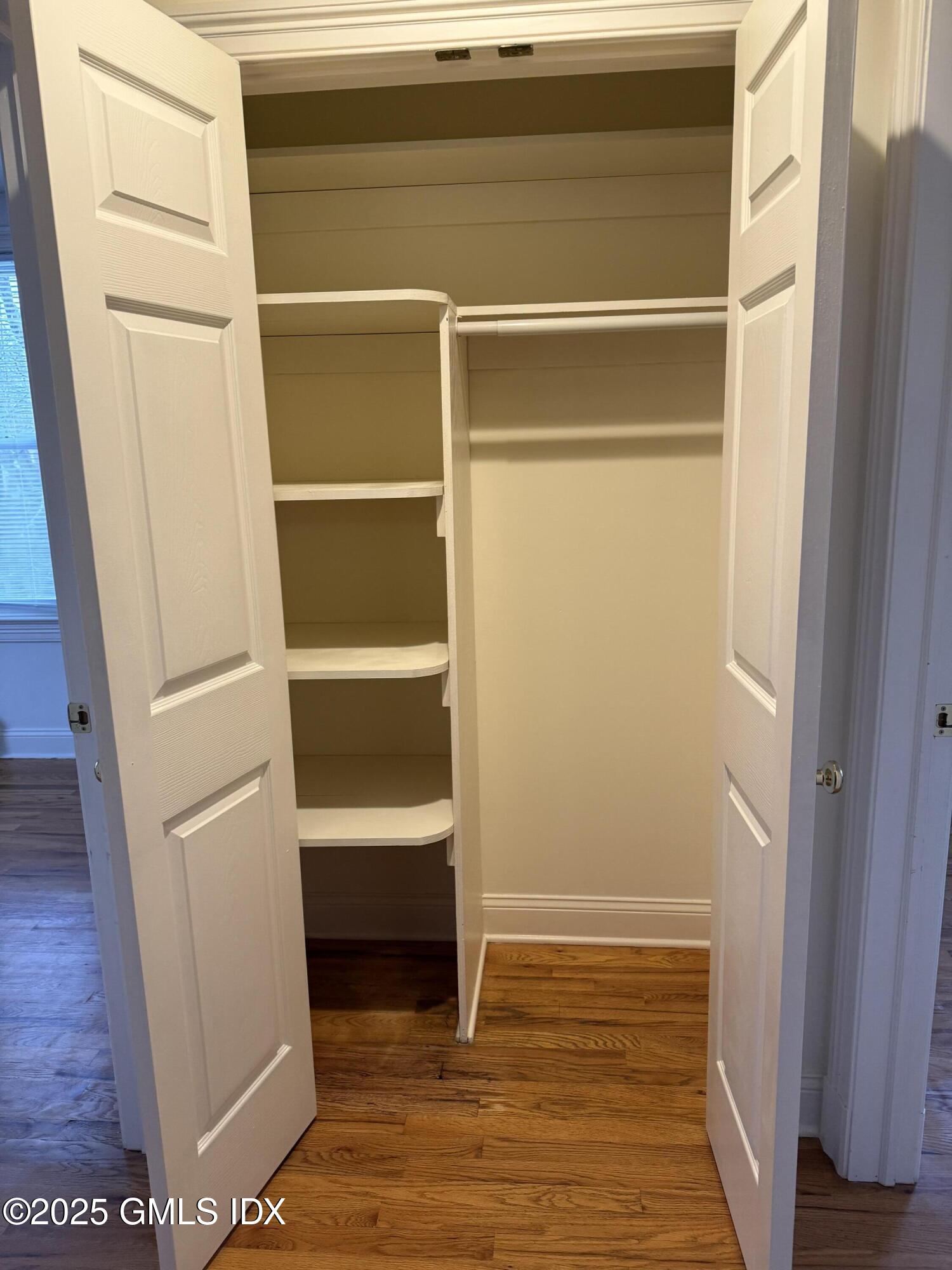 174 Davis Avenue, Unit 3A Greenwich, CT 06830 - Photo 6 of 7 a view of walk in closet with empty racks