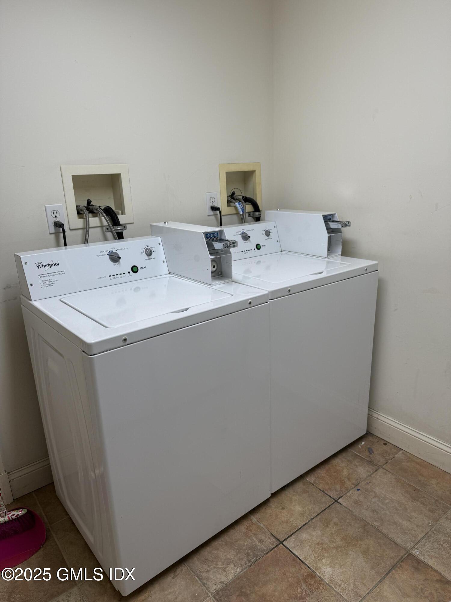 174 Davis Avenue, Unit 3A Greenwich, CT 06830 - Photo 7 of 7 a utility room with dryer and washer