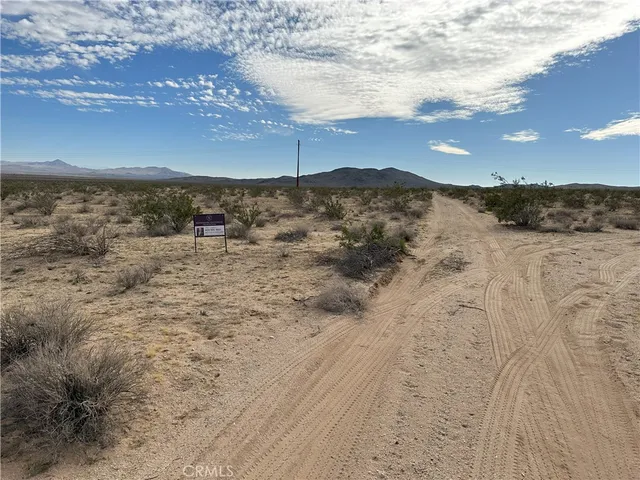 a view of ocean and mountain