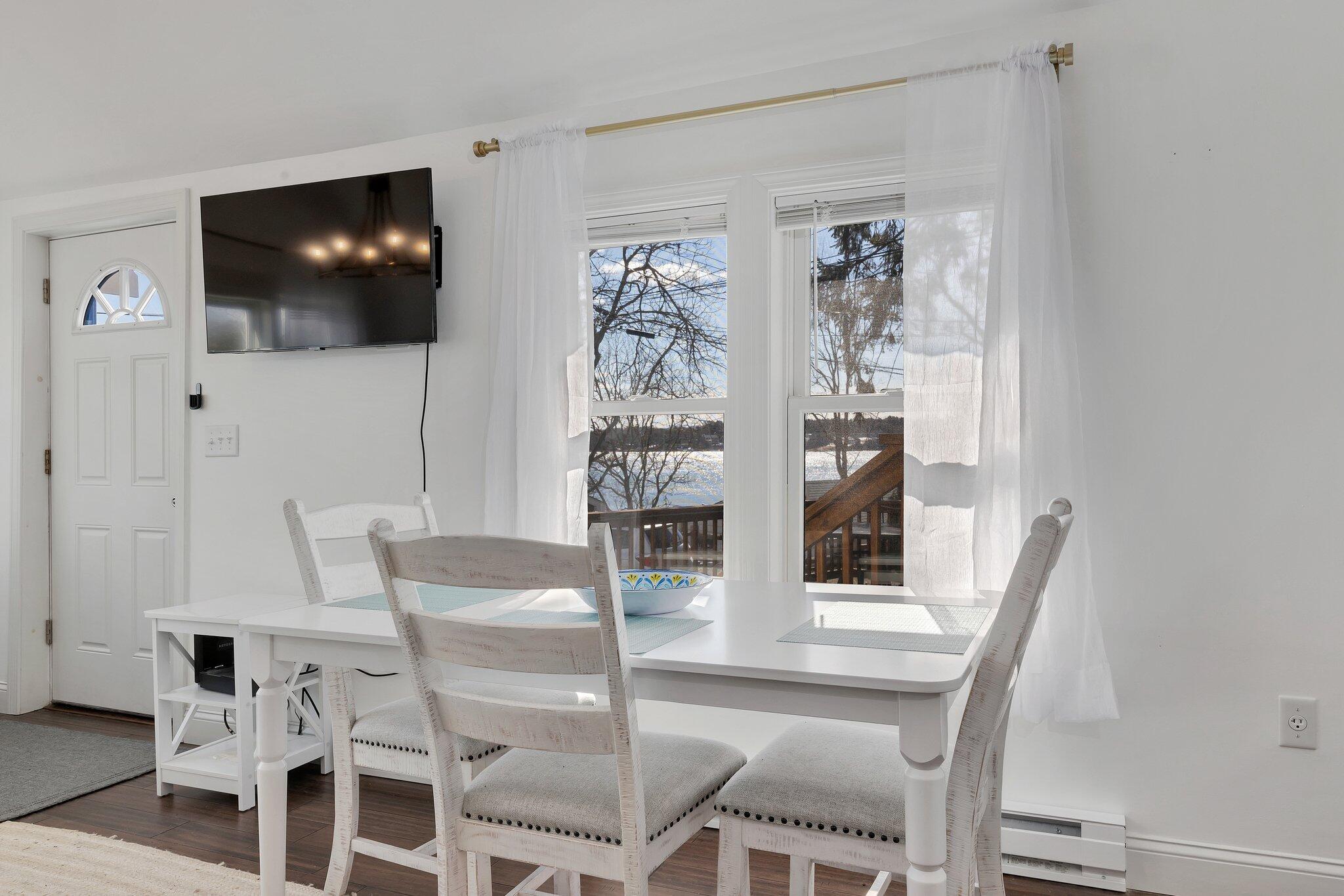 7 G Hideaway Road Buzzards Bay, MA 02532 - Photo 8 of 24 a view of a dining room with furniture and wooden floor