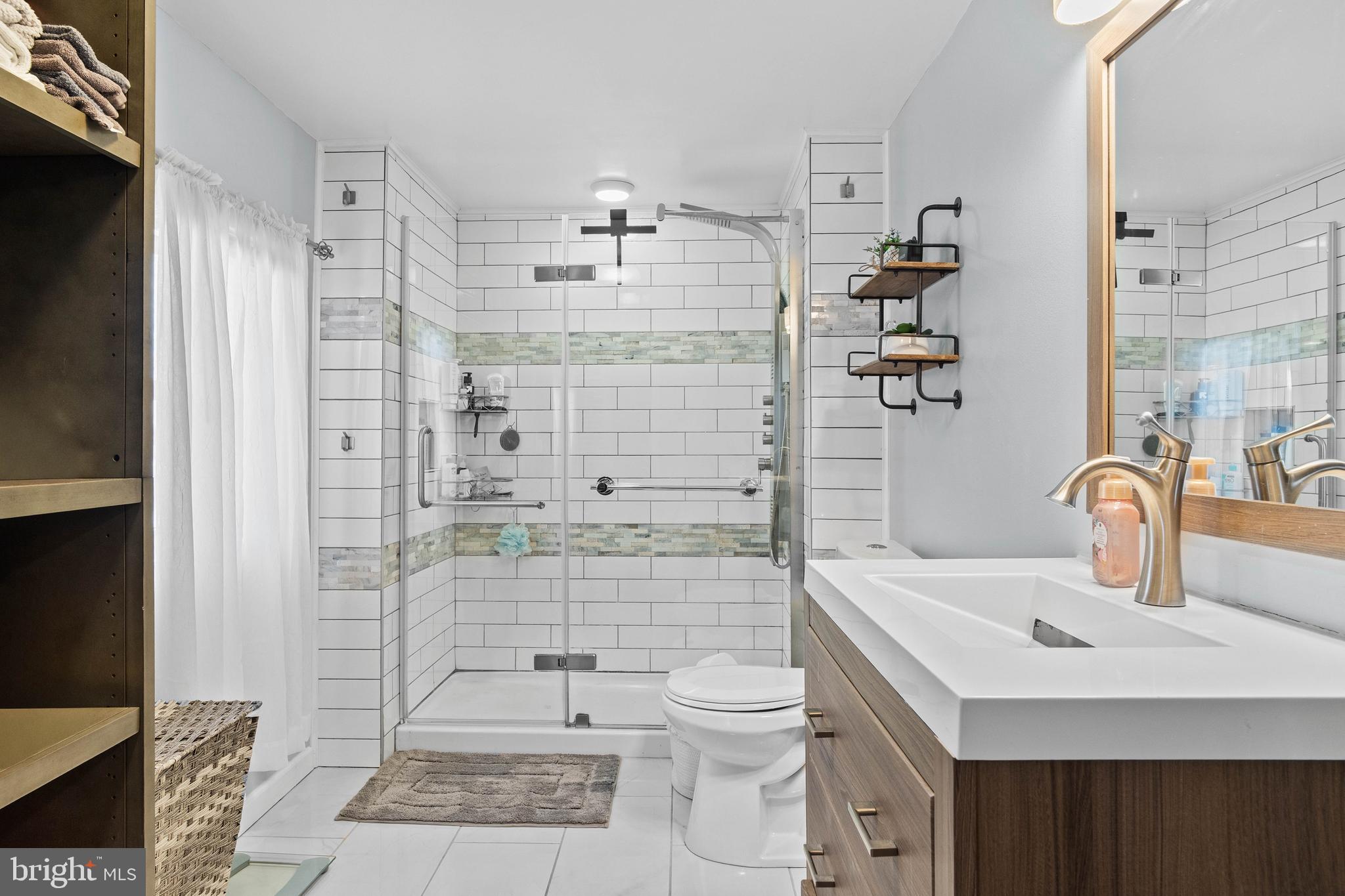 197 Ridge Street Smokerun, PA 16681 - Photo 24 of 47 a bathroom with a sink a toilet and shower
