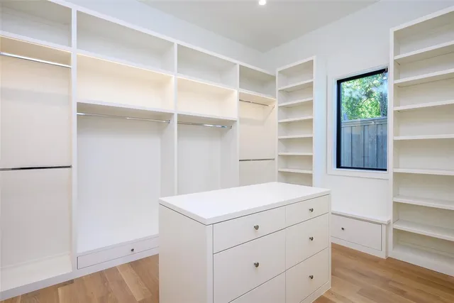 a view of an empty walk in closet