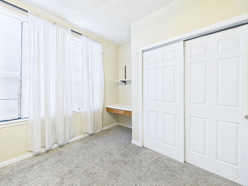 2300 Leon Street, Unit 204 Austin, TX 78705 - Photo 27 of 31 a view of an empty room with a window